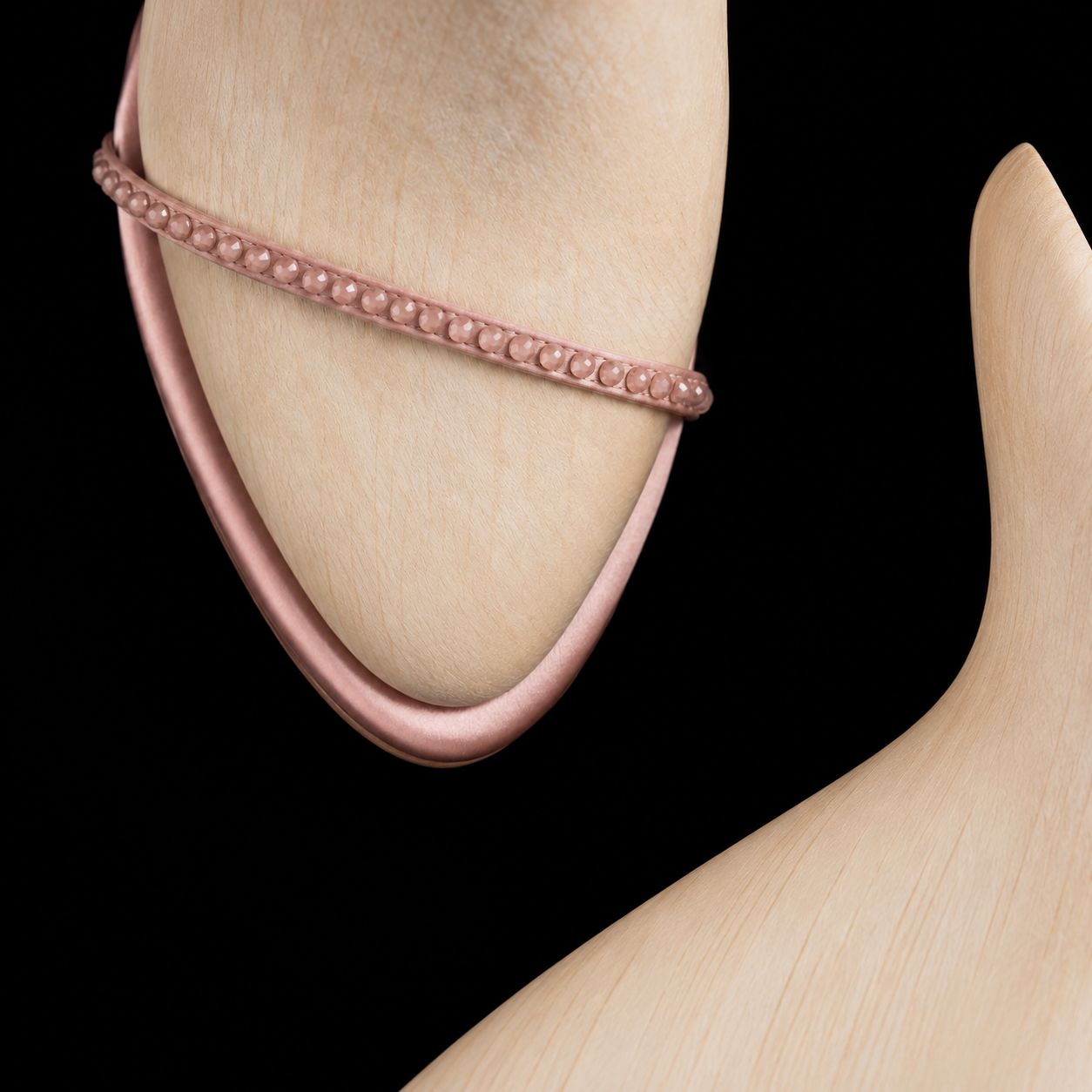 Wooden shoe lasts with an embellished Prota Fiori strap